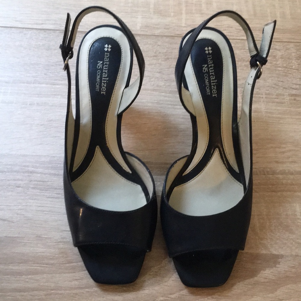 Open toe sling back heels. Size 8.5W.